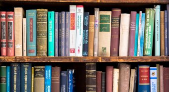 Books In Shelves At Library